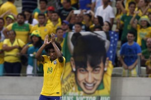 Willian of Brazil celebrates after winning their 2018 World Cup qualifying soccer match against Venezuela in Fortaleza, Brazil, October 13, 2015. REUTERS/Paulo Whitaker
